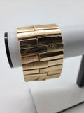 Kate Addison Boutique Gold Tone Stretch Bracelet with Interlocking dual Tone Elements